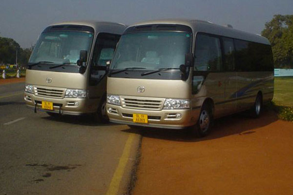 Toyota Coaster Japanese 13 seater - Imported Luxury Vans Rental Company - Car Rental Delhi