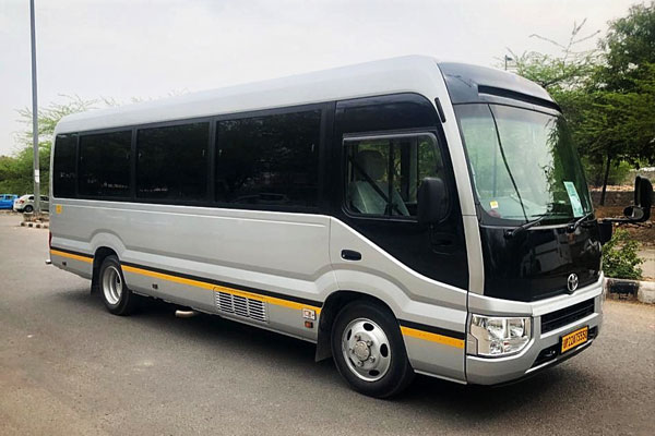 Toyota Coaster new shape - Imported Luxury mini bus Rental Company - Car Rental Delhi