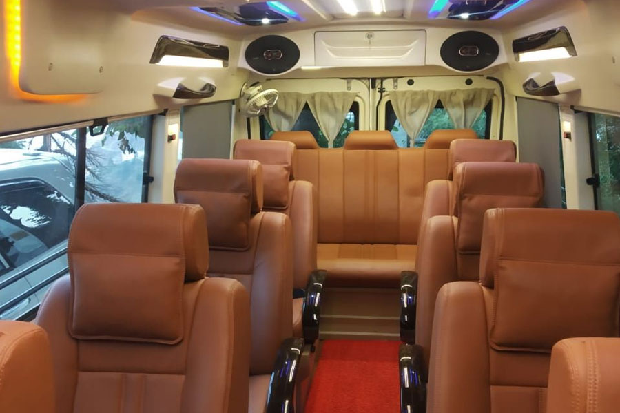 force traveller 12 seater rent